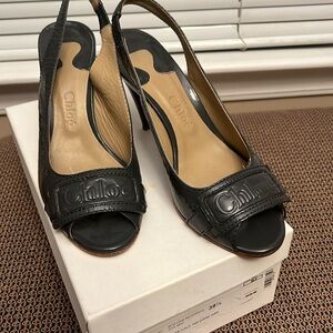 Chloe’ peep-toe sling back pumps.